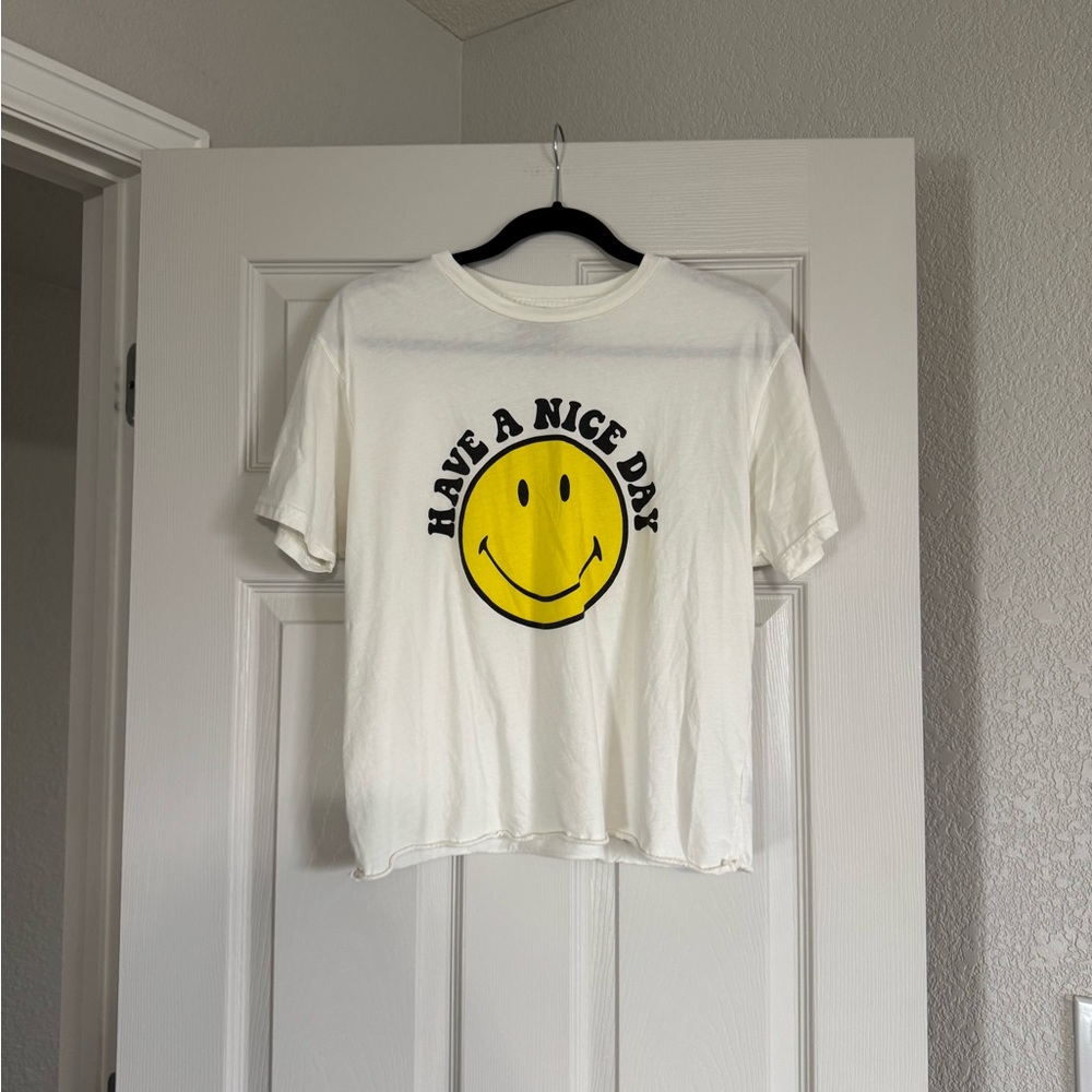 NWOT White T-Shirt with Smiley Face Graphic